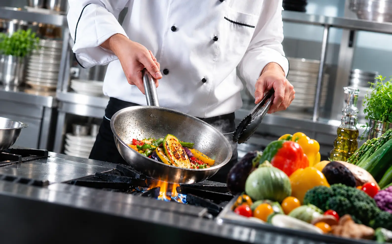 Relief chefs Wales - temporary chef cooking in a professional kitchen
